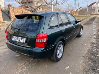 Vinde Mazda 323, 1998 a.f., benzină, mașinărie. Piata auto Transnistria, Tiraspol. AutoMotoPMR.