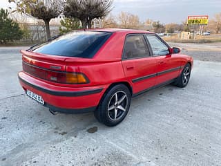 Vinde Mazda 323, 1993 a.f., benzină-gaz (metan), mecanica. Piata auto Transnistria, Tiraspol. AutoMotoPMR.
