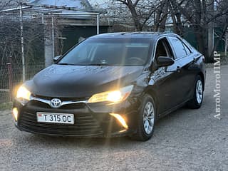 Тайота камри гибрид в отличном состоянии на обмен пишите